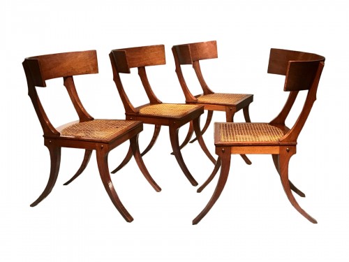 Set of four walnut klismos chairs