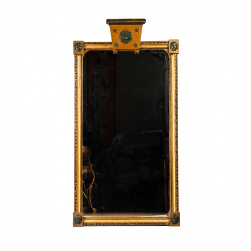 Mirror in gilded and patinated wood.