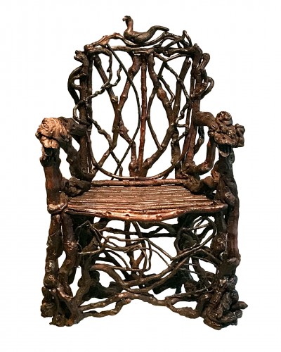 Extraordinary armchair composed of an assembly of branches of wood