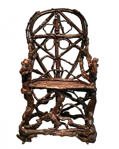 Extraordinary armchair composed of an assembly of branches of wood.