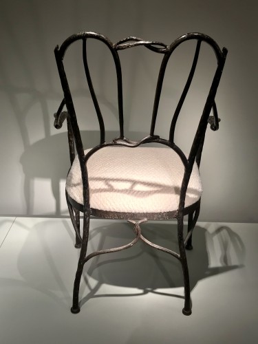Années 50-60 - Série de quatre fauteuils en fer noirci