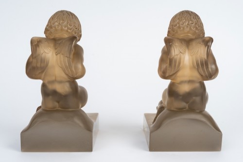 20th century - 1929 René Lalique - Pair Of Bookends "amour" Glass With Sepia Patina