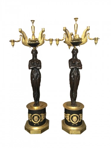 Pair of 19th century candelabras in patinated and gilded bronze