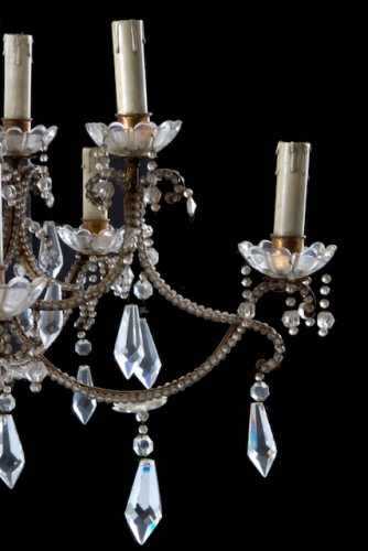  - Paire de lustres du XIXe siècle à 12 lumières en fer doré et pampilles