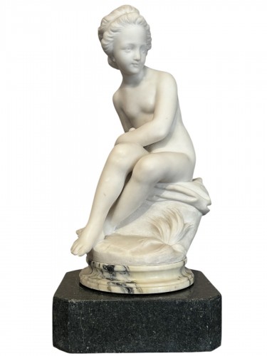 Psyche hiding the bow of love, 19th-century marble