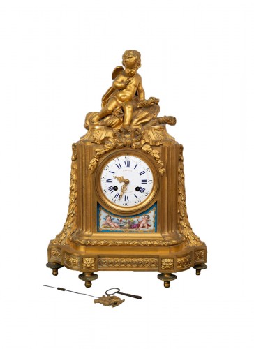 Napoleon III clock in gilt bronze and porcelain plates