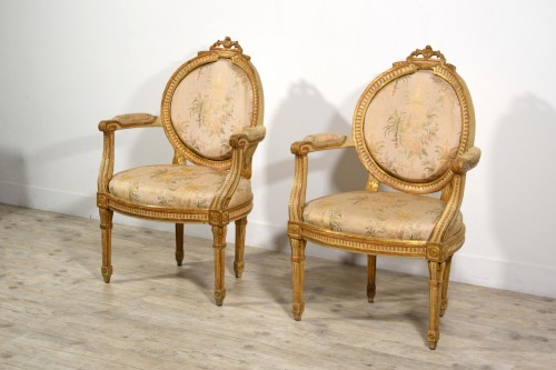 Seating  - Pair of Neoclassical armchairs, lacquered gilt wood, Italy 18th century