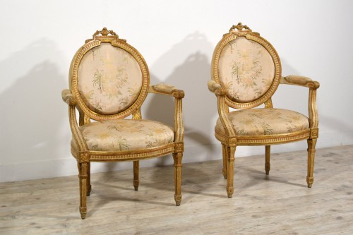 18th century - Pair of Neoclassical armchairs, lacquered gilt wood, Italy 18th century