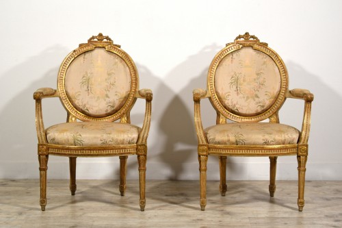 Louis XVI - Pair of Neoclassical armchairs, lacquered gilt wood, Italy 18th century