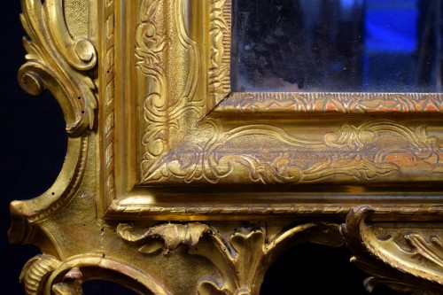 Antiquités - Miroir vénitien en bois sculpté et doré, XVIIIe siècle
