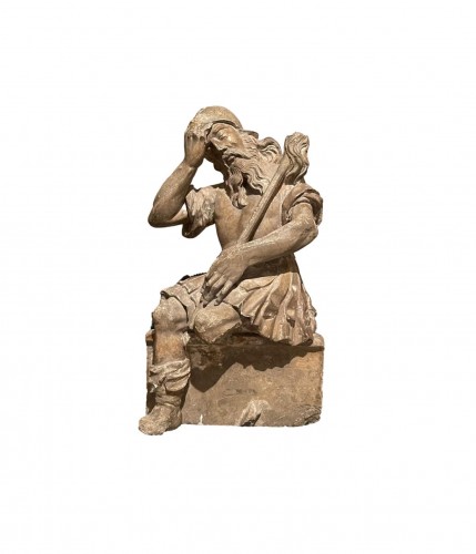 Renaissance limestone sculpture of a sleeping soldier