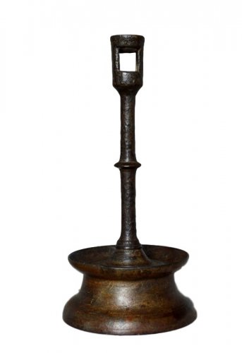 A brass gothic candlestick.Late 15th century.