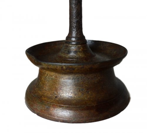 Lighting  - A brass gothic candlestick.Late 15th century.