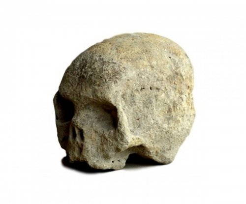 Stone carved Skull.16th century