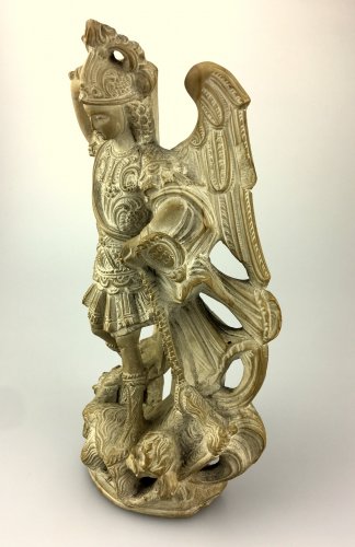  - A carved lava stone figure of St.Michael.17th century.