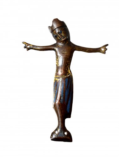 A Christ from a cross in engraved and champlevé enamel.  Limoges.13thc.