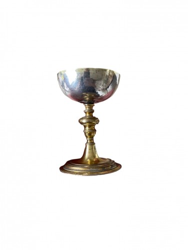 A gilt bronze and silver miniature Chalice. Early 17th century