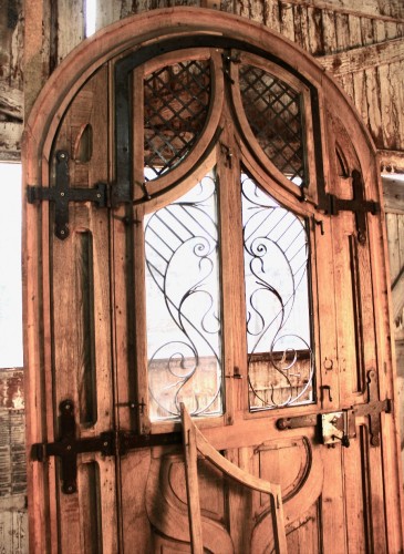 Art nouveau - Grande porte Art Nouveau en chêne et fer frogé