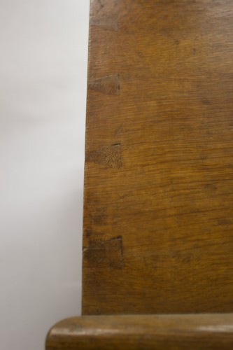 Antiquités - Coffre en chêne sur roulettes à dessus bombé XIXe