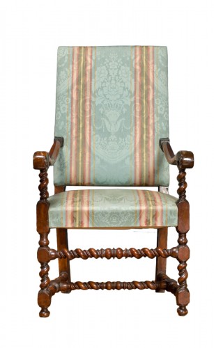 A walnut highback armchair, 18th Century