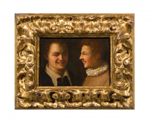 Laughing boys in a  17th century carved and giltwood frame