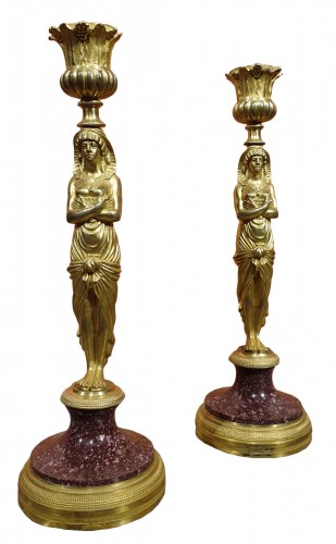 Pair of candlesticks in gilt bronze and porphyry