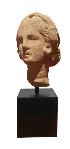 Hellenistic terra-cotta head of a woman 