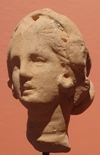 Hellenistic terra-cotta head of a woman  - Ancient Art Style 