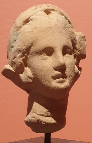 Ancient Art  - Hellenistic terra-cotta head of a woman 