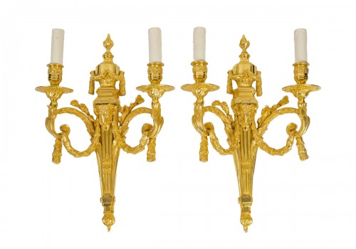 A Pair of bronze Wall - Lights in Louis XVI Style