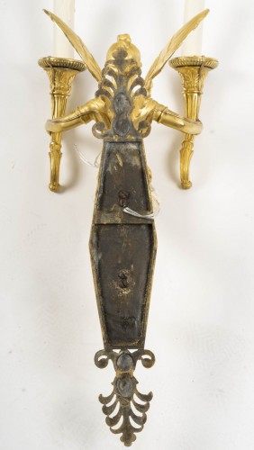 Antiquités - Paire d'appliques à décor de cariatides ailées, d'époque Empire