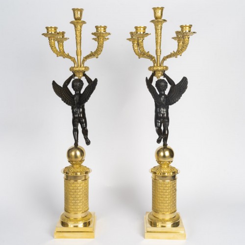 Grande paire de candélabres d'époque Empire en bronze doré et patiné - Empire