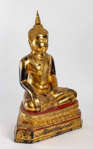 Asian Works of Art  - A gilt lacquered bronze Buddha
