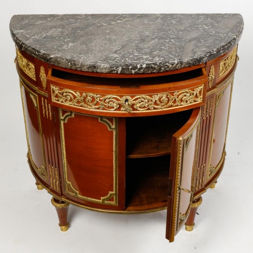 A Louis XVI style mahagony demi-lune commode - 