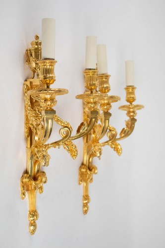 A Louis XVI style pair of wall lights - 