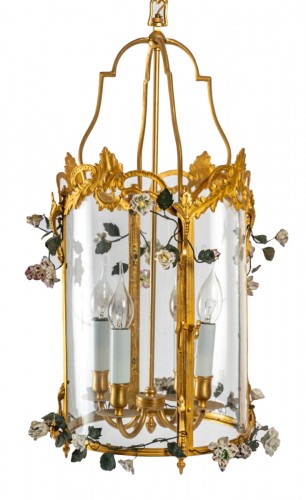 A Louis XV style lantern decorated with porcelain flowers