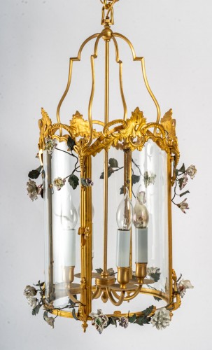  - A Louis XV style lantern decorated with porcelain flowers