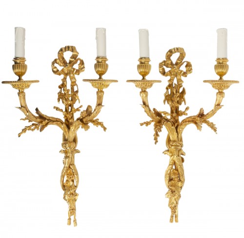 Pair of gilt bronze two-lights scones, late 19th century