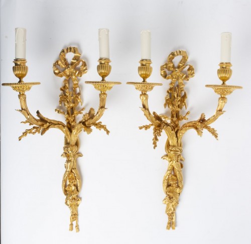 19th century - Pair of gilt bronze two-lights scones, late 19th century