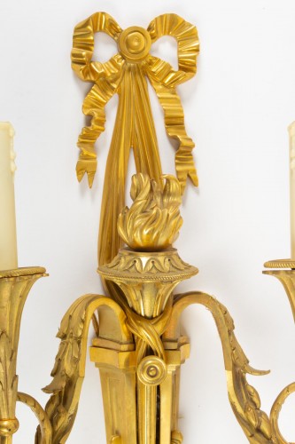 A Pair of Louis XVI style bronze scones. - 