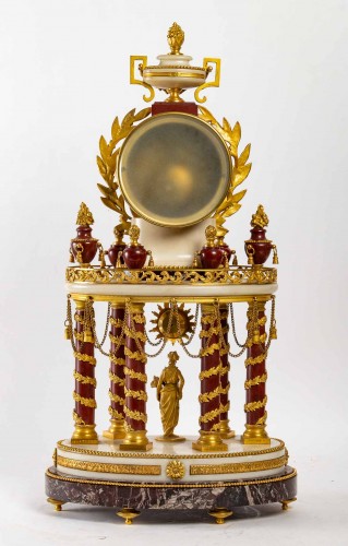  - A white marble and gilt bronze clock