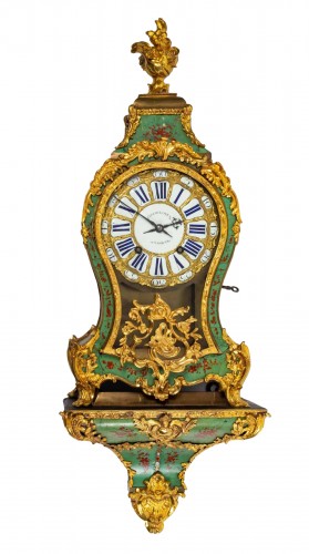 A Louis XV bracket clock signed &quot;Claude Goret A Amiens&quot;.