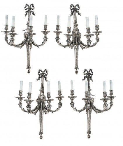 A Suite of Four silver bronze Wall - Lights