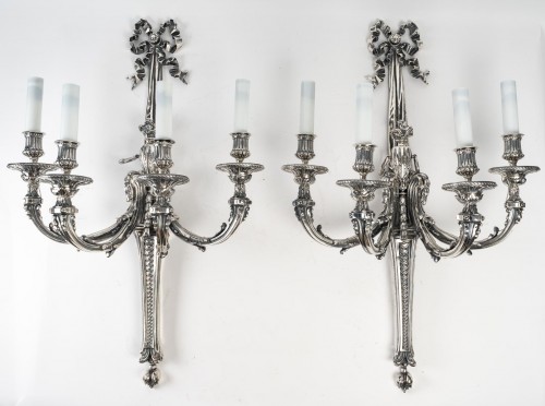 A Suite of Four silver bronze Wall - Lights - 