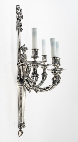 A Suite of Four silver bronze Wall - Lights - 