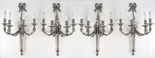  - A Suite of Four silver bronze Wall - Lights