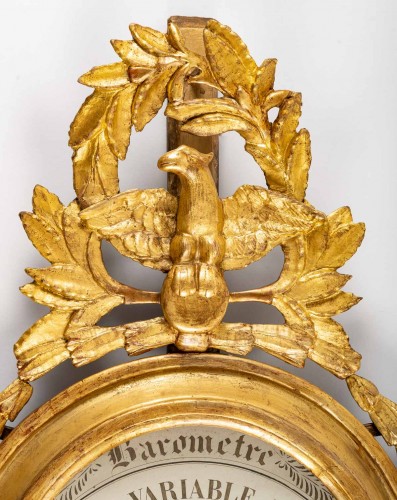 A Louis XVI gilt carved wood barometer - 
