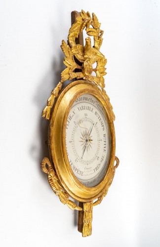 XVIIIe siècle - Baromètre en bois sculpté et doré d'époque Louis XVI