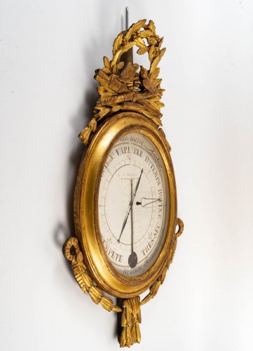 Baromètre - thermomètre en bois sculpté et doré d'époque Louis XVI  - Catel Antiquités