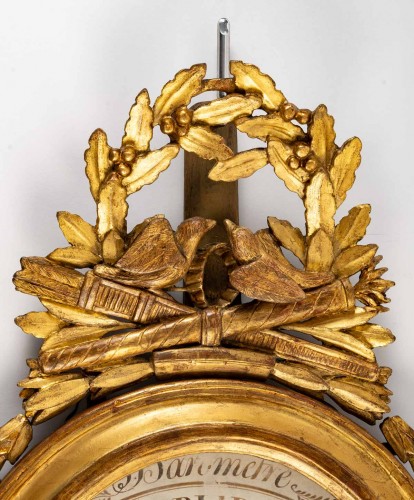 XVIIIe siècle - Baromètre - thermomètre en bois sculpté et doré d'époque Louis XVI 